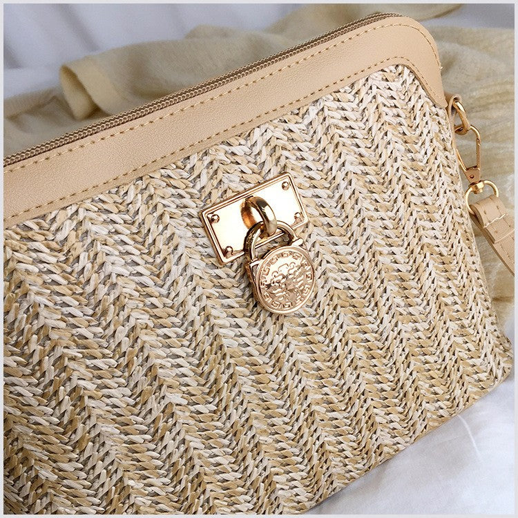 Bolsa feminina estilo em palha e rattan, com alça tiracolo/ombro.