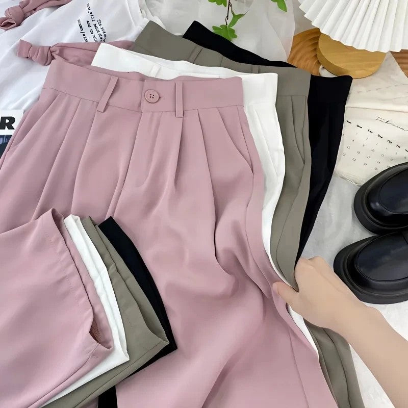 Calça feminina cintura alta, modelagem solta