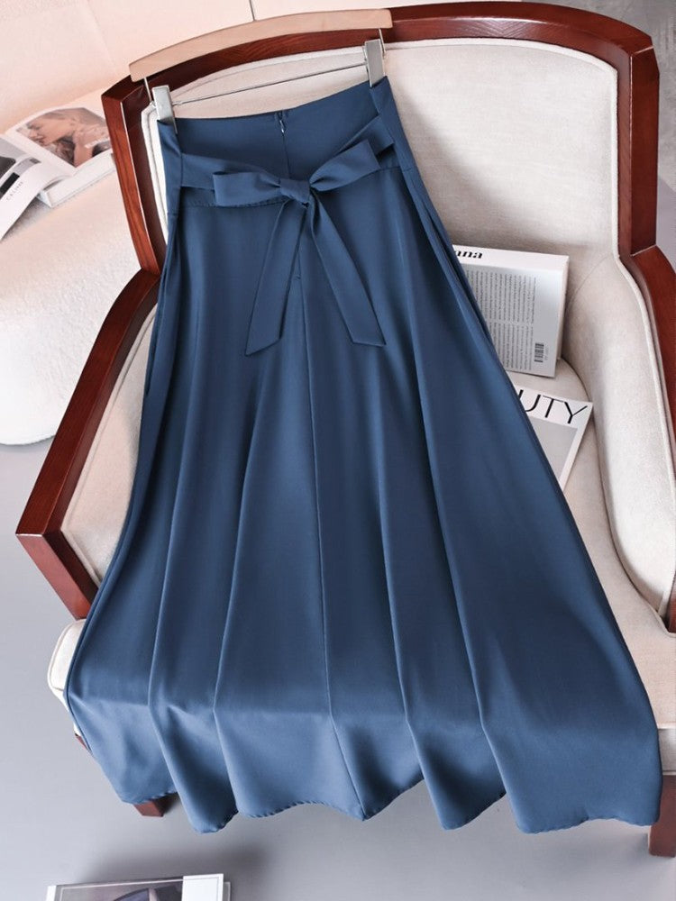 Saia longa feminina de cintura alta, elástica, com detalhe de laço