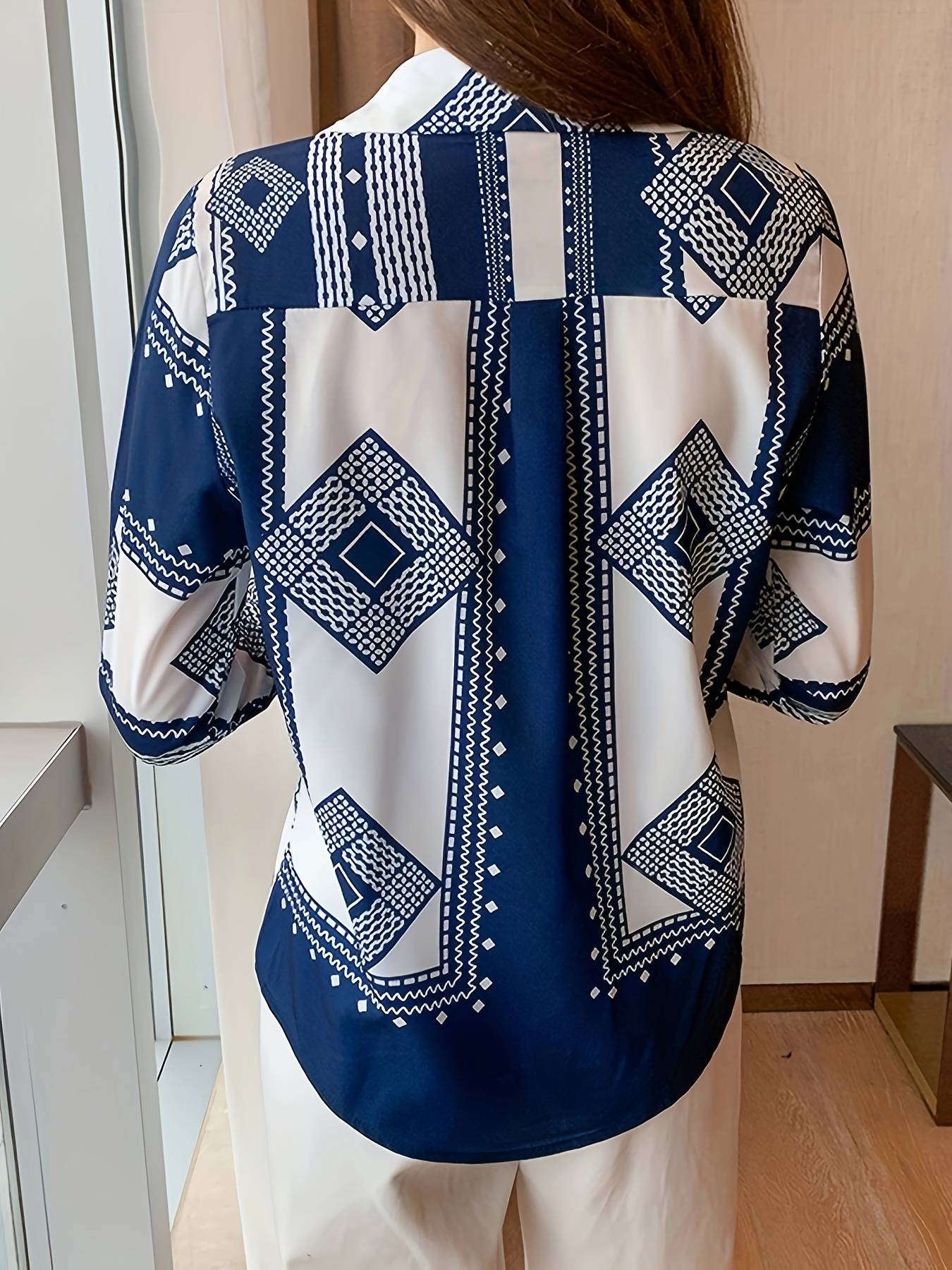 Blusa Manga Longa com Botão Frontal